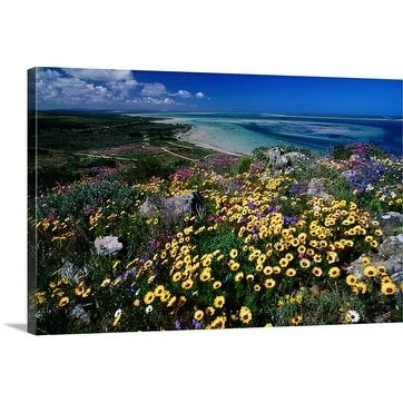 Frans Lemmens Premium Thick-Wrap Canvas entitled Yellow flowers with an ocean in the distance