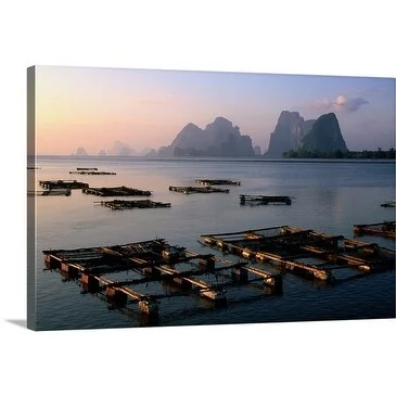 John Elk Premium Thick-Wrap Canvas entitled Boating docks in front of an island under a peaceful sky