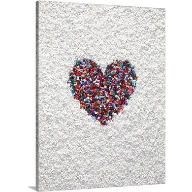 Premium Thick-Wrap Canvas entitled A heart formed by colored pills in a field of white pills