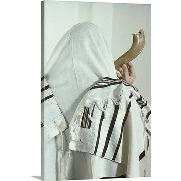 Premium Thick-Wrap Canvas entitled Orthodox Jew blowing shofar during Jewish New Year